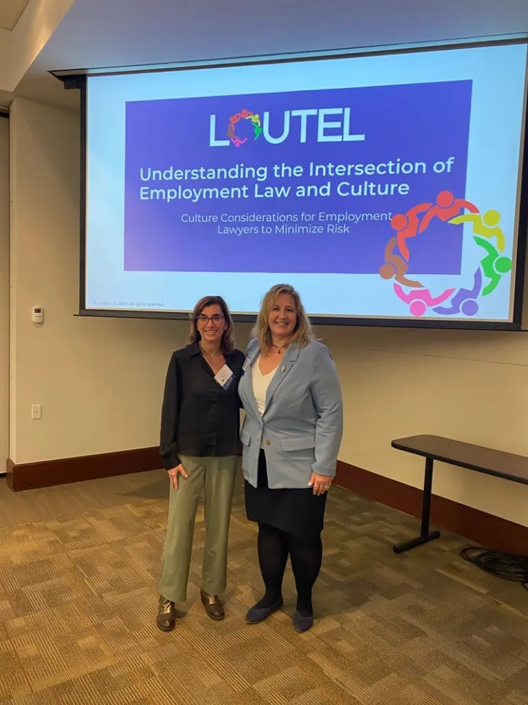 Robyn Forman Pollack (left) and Christina M. Reger (right) at a presentation.
